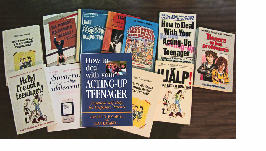 Photograph shows a copy of the book 'How to Deal with Your Acting-Up Teenager' and 11 other versions of the book, in different languages.
